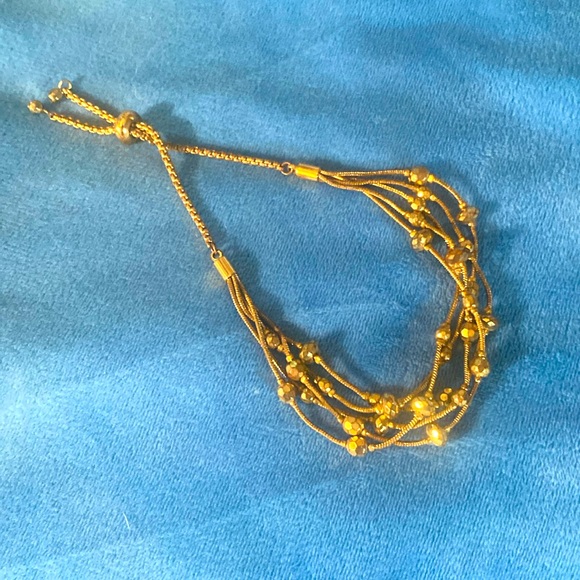 3/$15. Gold tone bracelet with slide closure - Picture 2 of 2